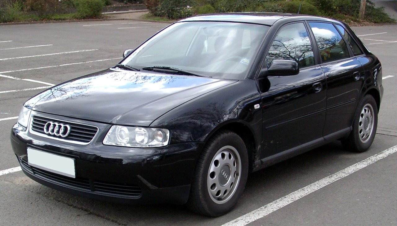 Front three-quarter view of a dark first-generation Audi A3 five-door hatchback