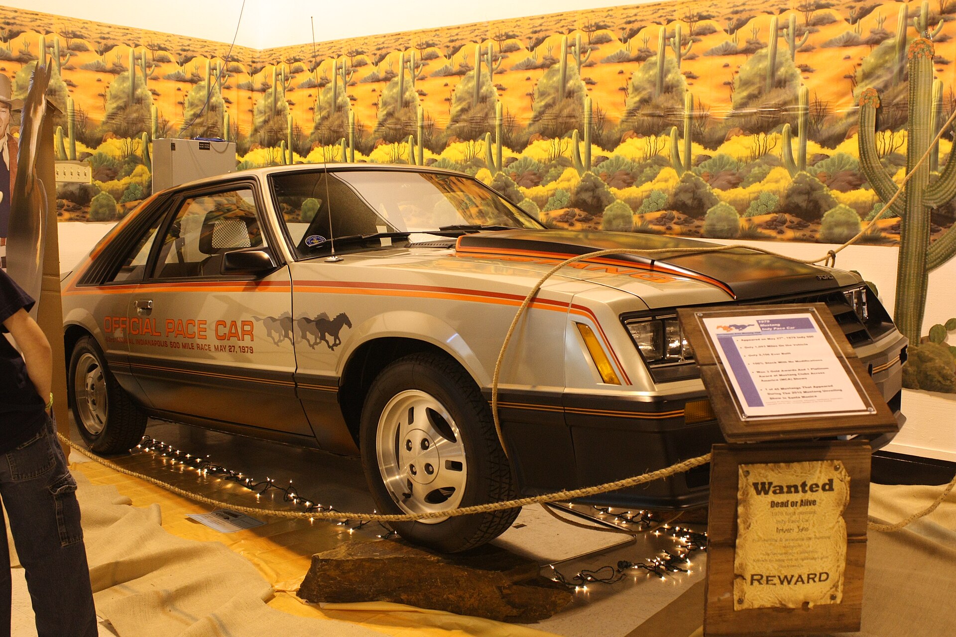Front three-quarter view of a silver and black 1979 Ford Mustang Indianapolis 500 Pace Car replica