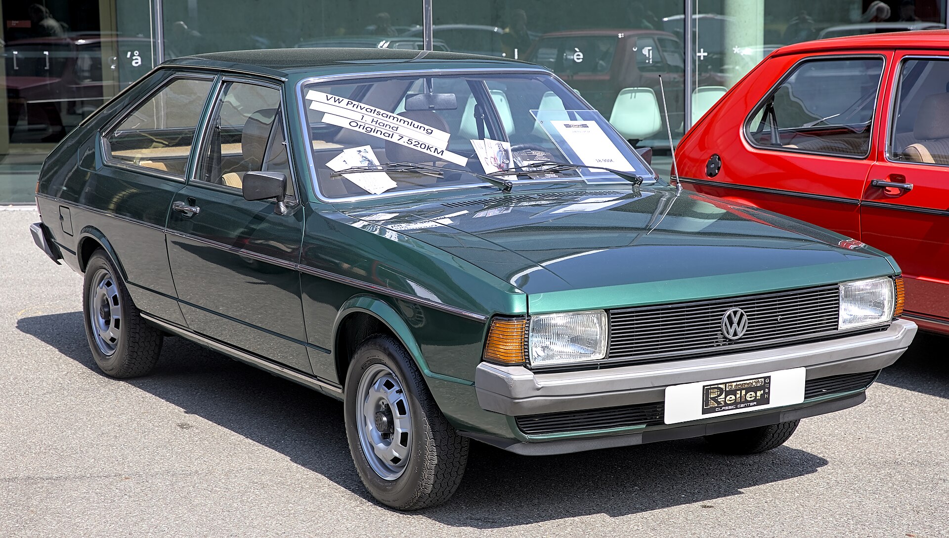 Front three-quarter view of a green first-generation Volkswagen Passat hatchback