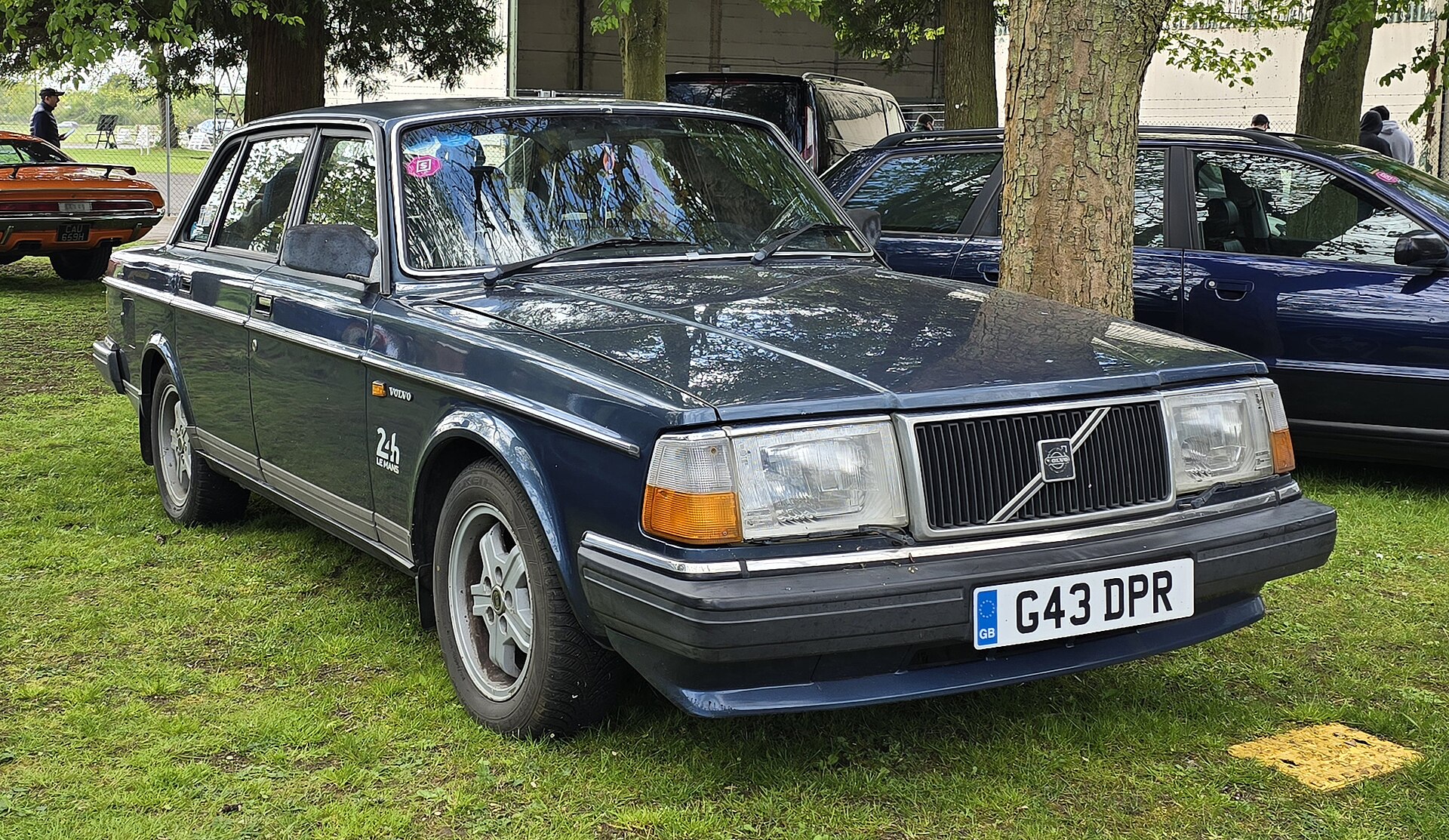 Front three-quarter view of a dark blue 1990 Volvo 240 GL saloon